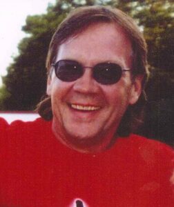 Picture of Dennis in a red shirt