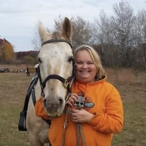 Picture of JoAnn with a horse